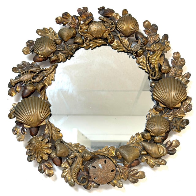 Victorian Brass Coral & Sea Life Circular Mirror, England, Late 19th Century This richly ornamented Victorian circular...