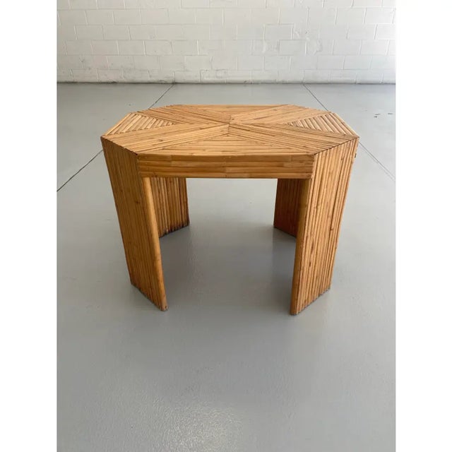 Late 20th century split Reed bamboo coastal style octagonal shaped side table . Table features a graphic x design to the...