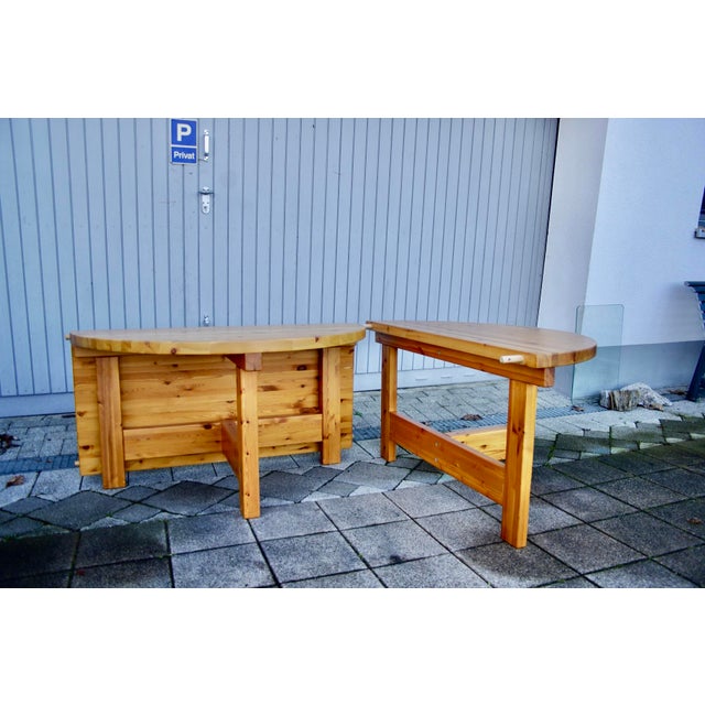 Danish extendable table in solid pine with a warm honey-colored patina, made in the 1970s and designed by Tage Poulsen....