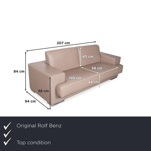 The Rolf Benz three-seater sofa in cream-beige is a high-quality piece of furniture made of genuine leather. It is...