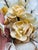 This is a vintage seashell floral arrangement crafted from natural shells. The design features delicate hand-assembled...