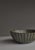 A classic stoneware bowl by renowned Danish ceramicist Arne Bang, model 189, showcasing his signature combination of...