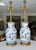 Pair of late 19th century Qing Chinese porcelain Famille Rose vases mounted as table lamps on gilt wood bases, made by the...