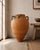Originally used to store oils, water, and other liquids or foods, this antique vessel is not modernly water safe and...