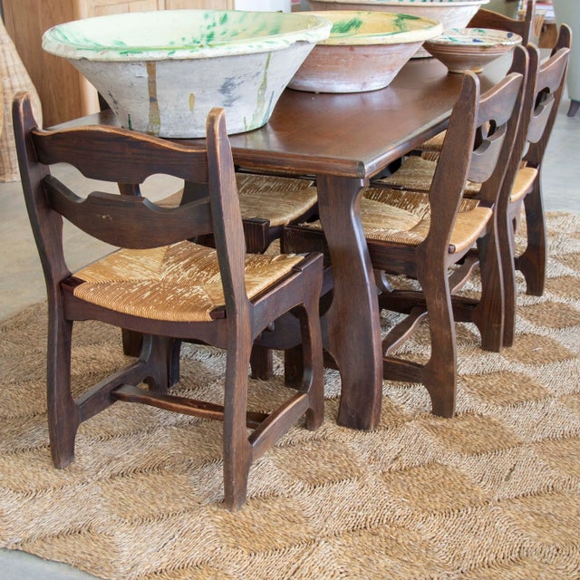 Stunning set of 6 dining chairs in the style of Robert Guillerme and Jacques Chambron from France, 1950's. Made of solid...