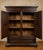 An important Louis XIII period Burgundian armoire, crafted from walnut, boasting a powerful architectural style and...