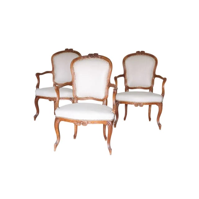 Exuding timeless elegance, this set of eight exquisite Louis XVI Dining Chairs hails from France, crafted around 1700....