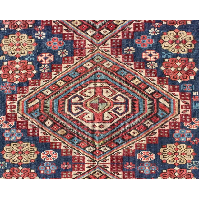 Late 19th Century Antique Kazak Tri- Medallion Rug With Multi Coors and Indigo Background For Sale - Image 5 of 8