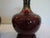 Chinese Vintage Flambe Sang De Douf Vases With Rosewood Stands For Sale - Image 3 of 4