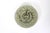 Vintage, textured, earthy green studio pottery plate with a carved detail. Has a wire on the back to hang on the wall....