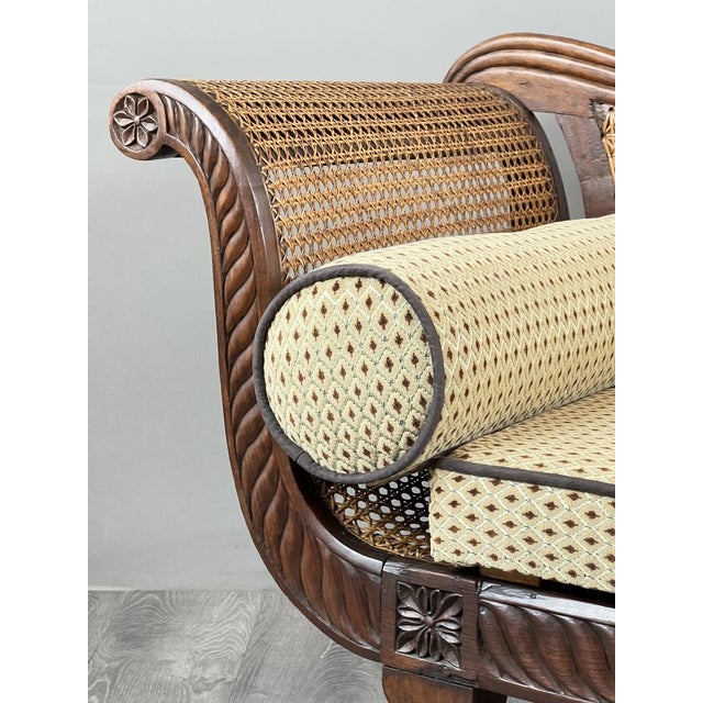Elegant Louis XVI style chaise longue in carved wood, resting on turned and fluted legs, decorated with rosettes and...
