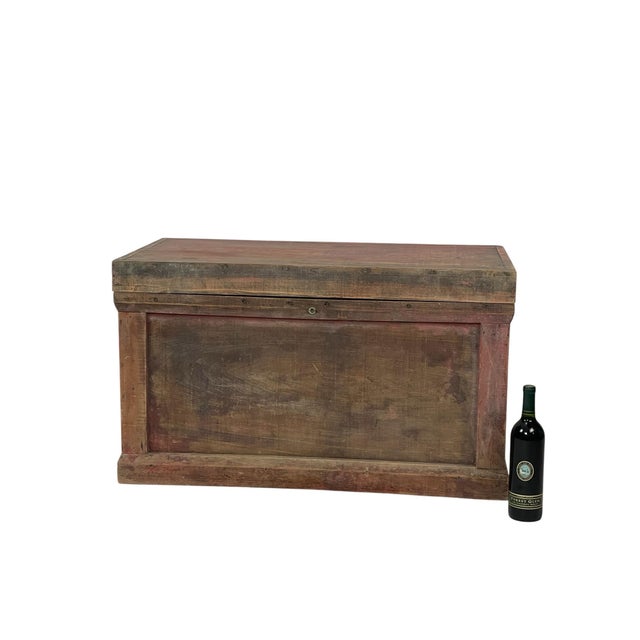 Antique Chinese red painted wooden trunk with original finish and metal hardware. Heavy patina with age-appropriate wear....