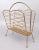 A stylish Mid-Century Modern style brass double compartment magazine rack. This fine magazine rack has a fabulous Mid-...