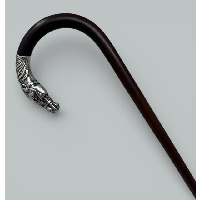 Very Stylish Fine Quality Polished Grained Rare Snake Wood Lady’s or Gentleman’s Walking Cane of substantial quality. The...