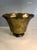 This stunning 1970s Fluted Scalloped Edge Brass Planter, Footed will be a standout on your tabletop, filled or unfilled....