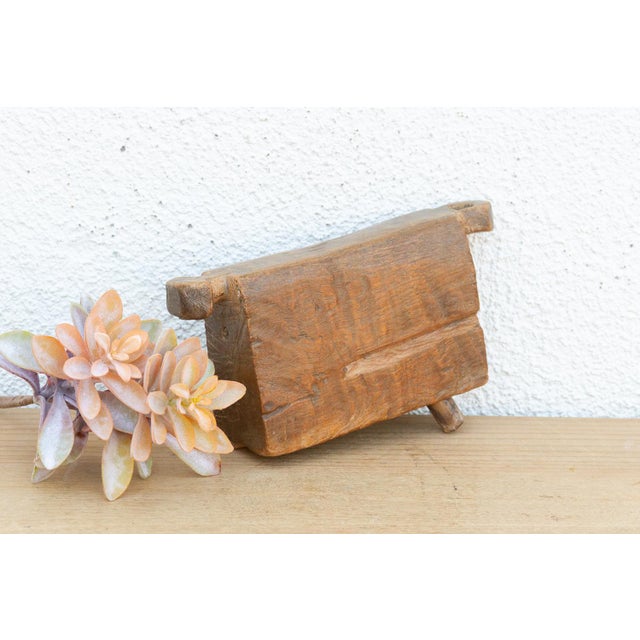 A fascinating piece of primitive folk art, this large wooden bell was originally hand-carved to hang around the neck of a...