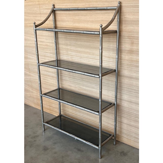 French Faux Bamboo Etagere with Four Shelves and Mate Chrome Finished. The glass are grey smoked. Place of Origin: Europe