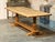 A clean good quality Solid Oak Farmhouse Dining Table comfortably seating 12. French in origin and dating to the early...