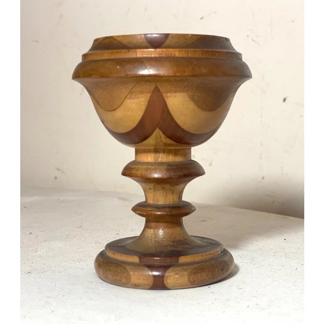 Up for sale is a wonderful antique hand turned decorative egg stand. It's made out of many natural pieces of wood...