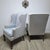 A handsome and exceptionally well-made pair of wingback lounge chairs by Hickory Chair, featuring tall shaped backs,...