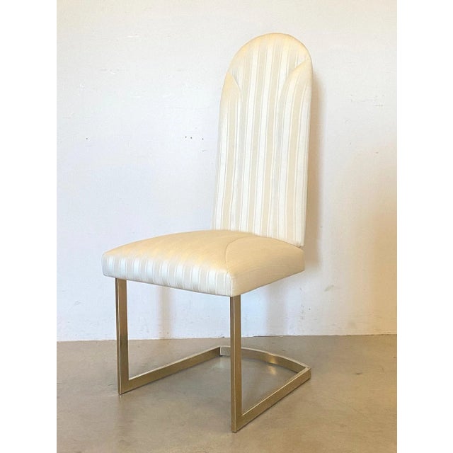 Set of 6 dining chairs from the 1980s, gilded metal base, seat and back upholstered and covered in beige fabric.