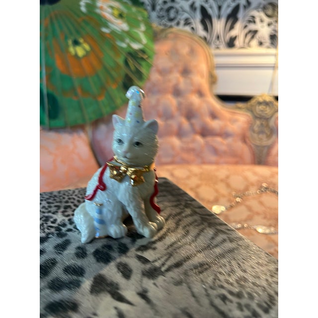 Up for consideration is a beautiful vintage small ceramic Lennox birthday cat with party hat. This would look lovely in...