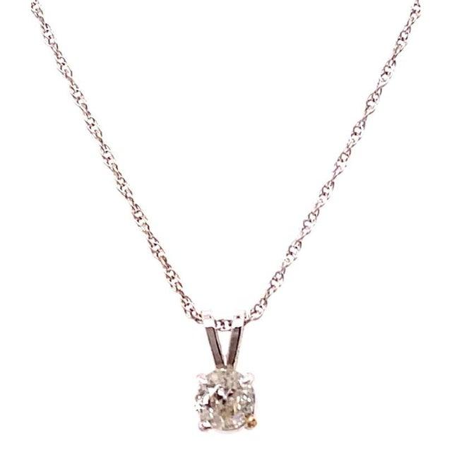 14 Karat White Gold 18 Inch Fancy Necklace with Diamond Round Pendant. 0.50 total carat weight 1.45 grams total weight.