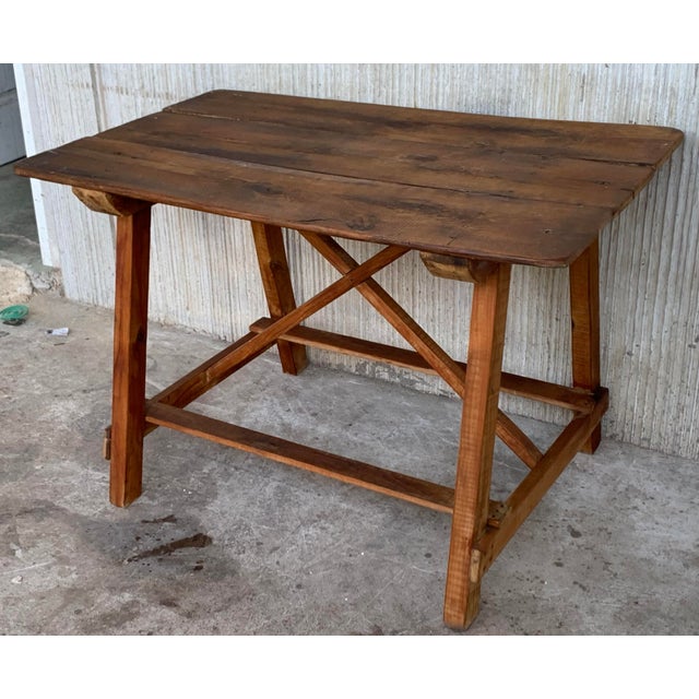 19th Spanish Country House pine farmhouse / prep console table with wood stretcher. Dimensions Height: 29.14 in. (74 cm)...