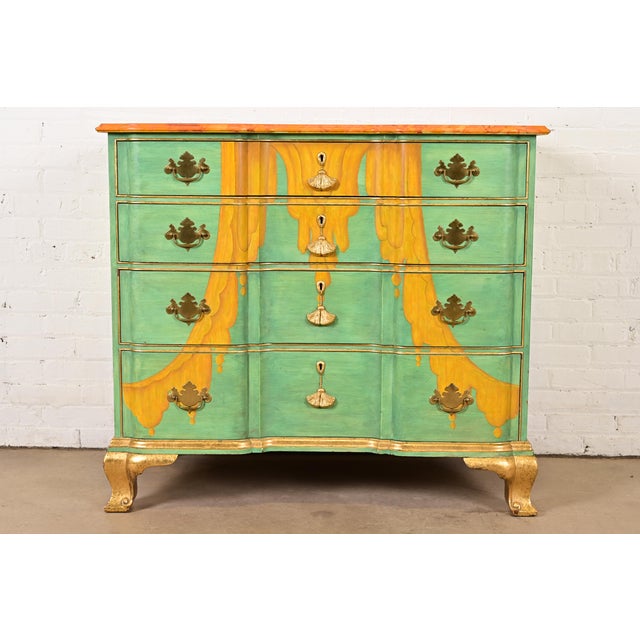 An outstanding Georgian or Chippendale style four-drawer dresser, chest of drawers, or commode By Kindel Furniture USA,...