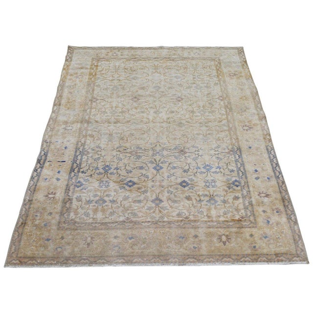 Hand-knotted with care using traditional rug-making techniques, this wool rug blends timeless craftsmanship with a modern...