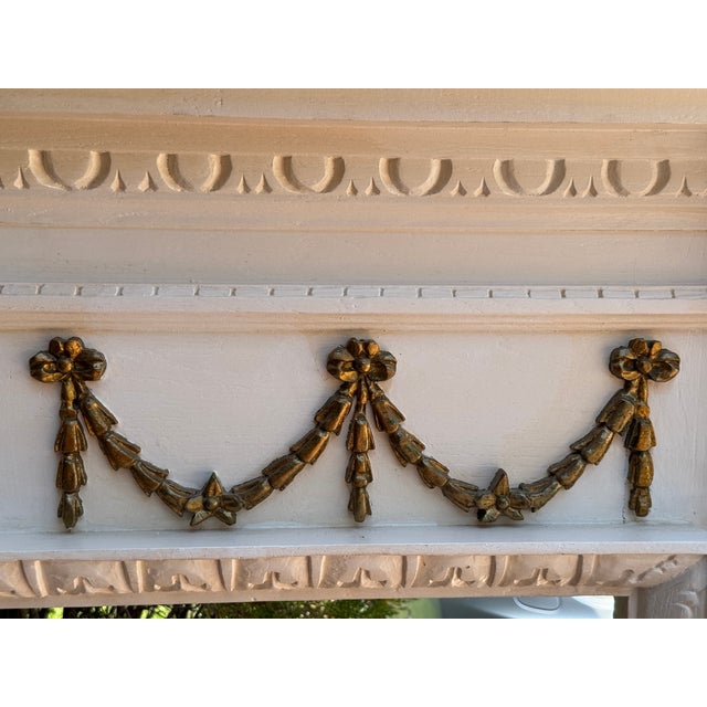 Bring timeless European elegance into your home with this striking Louis XVI-style fireplace mantel, beautifully finished...