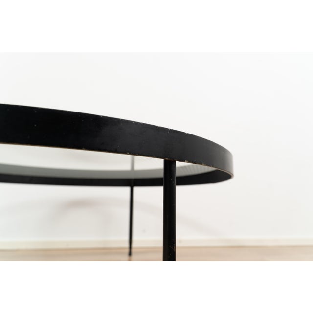 Coffee table by Janni van Pelt for Metaform. The table comes with a glass top surface with a checkered pattern on a three-...