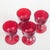 Reijmyre Glasbruk 4 port wine glasses, 1950s. Set of four ruby-red port wine glasses with rounded bowls and profiled...