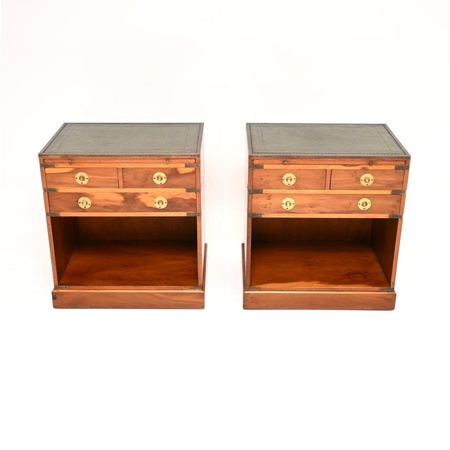 A smart and extremely well made pair of antique yew wood military campaign bedside cabinets / side tables. They were made...