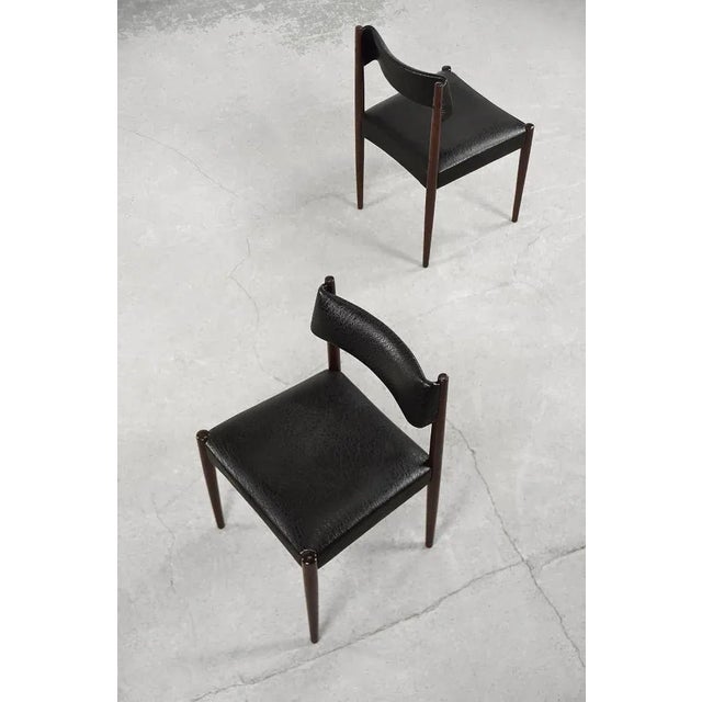 This set of two elegant dining chairs was designed by Aksel Bender Madsen for the Dutch manufacture Bovenkamp during the...