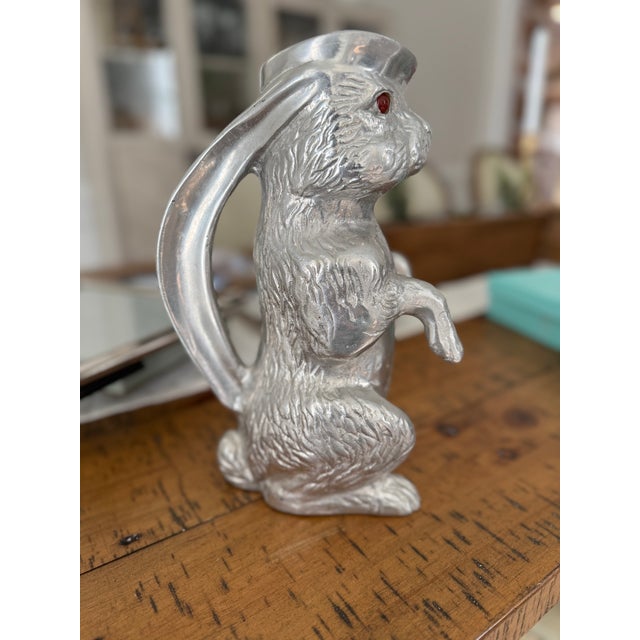 Vintage and individually handmade Arthur Court aluminum pitcher in the form of a bunny rabbit with red glass eyes standing...