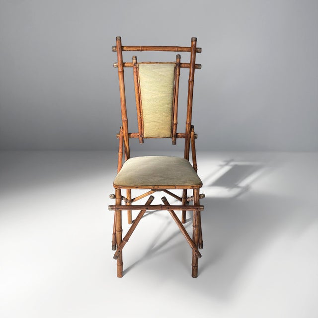 Italian art deco chairs in fabric and bamboo, 1930s Pair of chairs with dark brown bamboo frames, characterized by...