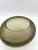 Oval vase with rounded shoulders in heavy iron gray glass, featuring overlapping colors. The vases from Paolo Venini's...