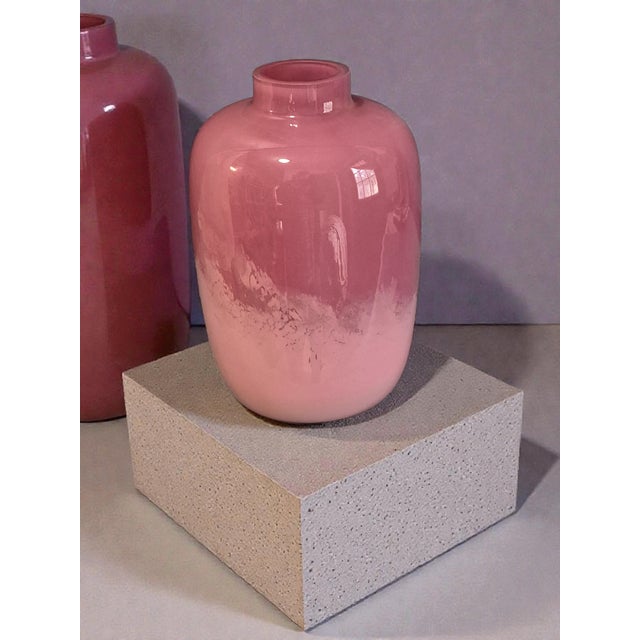 This Italian Art Glass Rose Pink Ombre Two Tone Vase is a hand-blown glass piece with a beautiful Ombre pattern in shades...