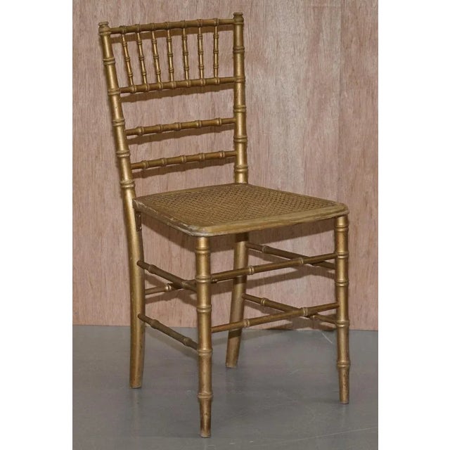 We are delighted to offer for sale this lovely pair of original Regency style giltwood famboo chairs A very good looking...