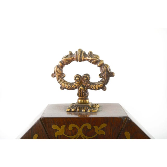 Beautiful 19th century mahogany wood with gilt brass inlay design detail. The desk clock feature two side pull handles and...