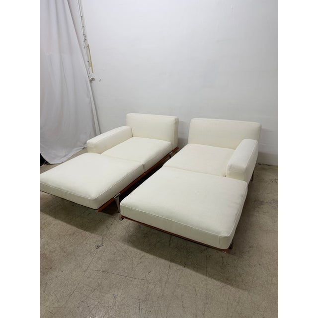 Pair of Let It Be daybeds with downfilled Italian fabric off-white with a slight cream tone cushions on a leather wrapped...
