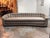 Design Plus Gallery presents a Bespoke Curved Tufted Tuxedo Sofa in Taupe Upholstery. This custom sofa has a curved tuxedo...