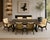 An extraordinary, investment-grade 7-piece Mid-Century Modern Japanese dining suite marrying architectural brutalist...