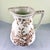 An oversized ironstone pitcher in the Aesthetic Taste, made by Holmes, Plant & Mayday at The Sylvester Pottery Works –...