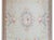 This late 20th-century hand-woven Indian rug beautifully reinterprets the storied elegance of French Aubusson carpets. At...