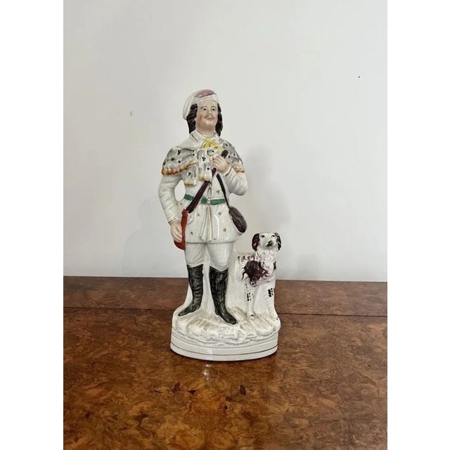 Unusual large antique Victorian Staffordshire figure having an unusual large antique Victorian Staffordshire figure of a...