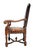 An Antique Gentlemans Occasional European Leather Chair with metal studs all around. Wood Frame with Antique Leather seat...