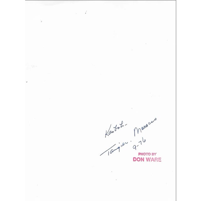 1976 black and white photo by Los Angeles, Calfornia based photographer Don Ware. of a sign pointing to the Kasbah in...