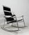 Construction made of chrome-plated metal and black leather, Dimensions approx.: H. 100 cm, W. 80 cm, D. 80 cm.